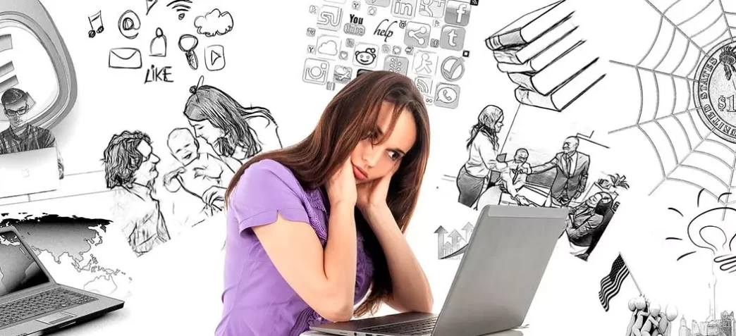 Mujer frente a un ordenador rodeada de dibujos que representan distracciones y estrés mental.