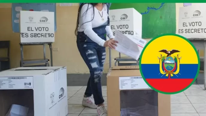 Ciudadana deposita su voto durante las preguntas del referéndum en Ecuador 2025.