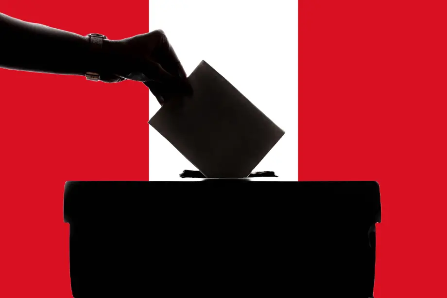 voto peruano en Europa representado con urna y bandera del Perú