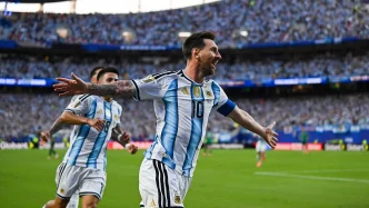Lionel Messi celebrando su gol con la camiseta de Argentina durante el Mundial 2026.
