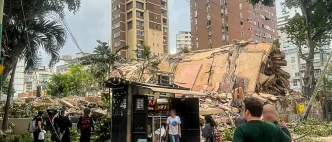 Escenas de destrucción tras el terremoto en Venezuela, con equipos de rescate trabajando entre escombros, como se ve en image - 2026-06-26T174123.462.jpg.