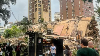 Escenas de destrucción tras el terremoto en Venezuela, con equipos de rescate trabajando entre escombros, como se ve en image - 2026-06-26T174123.462.jpg.