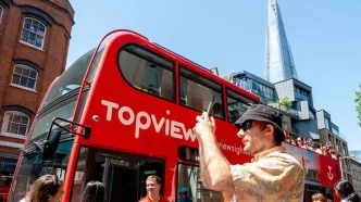 Autobús turístico de TopView durante sus operaciones antes del cierre TopView Londres.