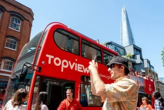 Autobús turístico de TopView durante sus operaciones antes del cierre TopView Londres.